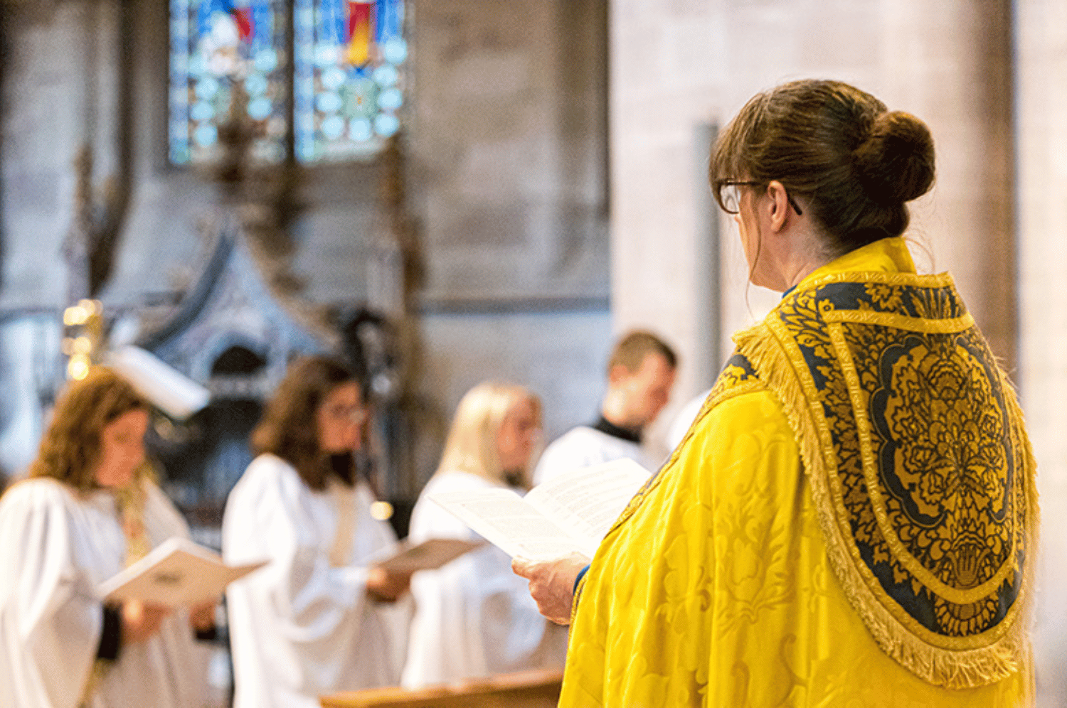Ordination service 2022 female deacon's kneeling at altar