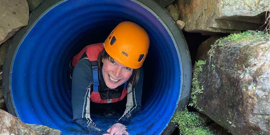 Revd Luci Morriss in a tunnel in hard hat
