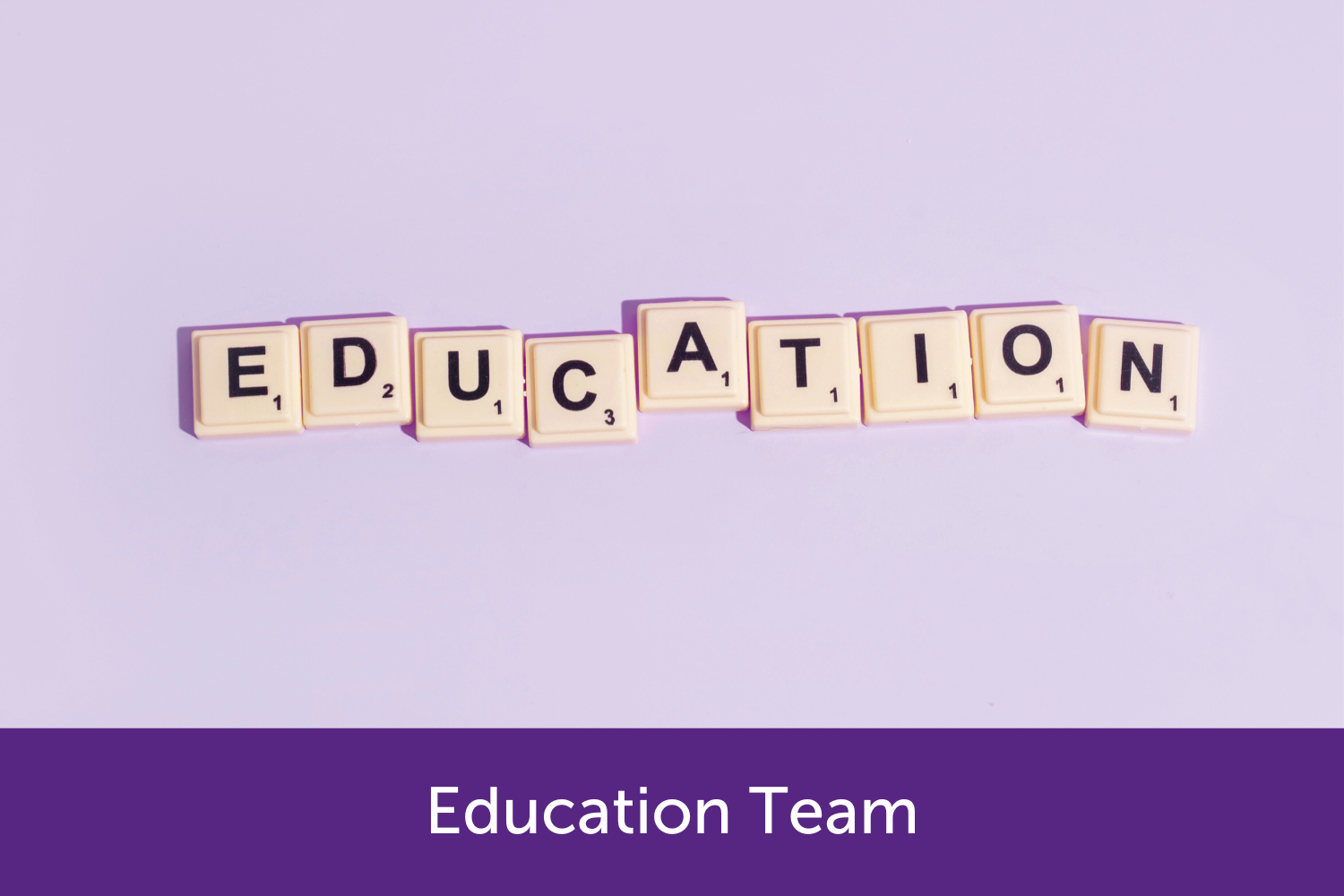 Education spelt out with tiles