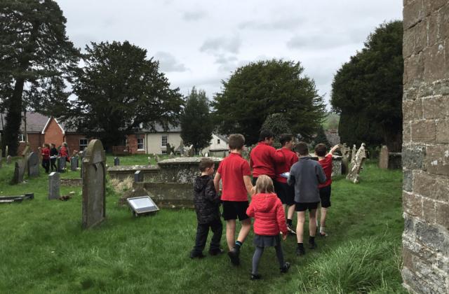 school children churchyard Clun