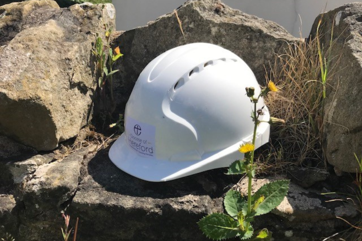 Hard hat sat on rocks