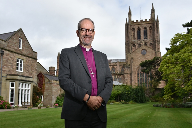 Bishop Richard Jackson in front of Hereford Cathedral